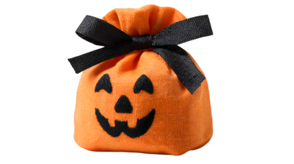 Orange Halloween pumpkin treat bag tied with black ribbon, isolated on white background