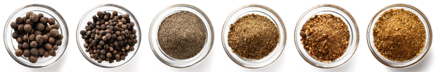 Collection of various colorful culinary spices in bowls, top view, isolated on white background