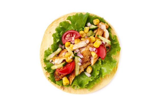 Enjoy a Delicious Chicken Taco filled with Fresh and Colorful Vegetables and Ingredients