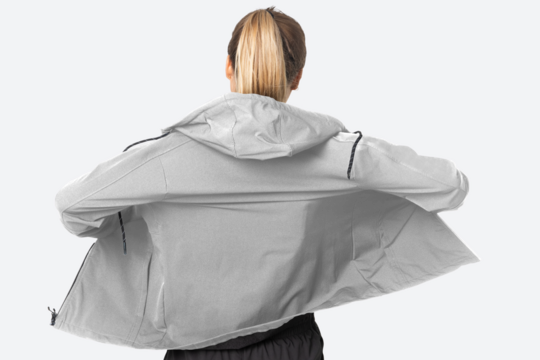 Png women's windbreaker jacket mockup rear view sportswear fashion shoot