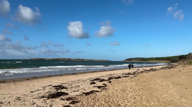 The beach at Newborough Warren and Llanddwyn Bay on the Isle of Anglesey in Gwynedd off the north Wales coast.
