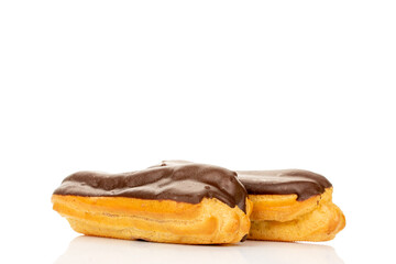 Chocolate sweet eclair, macro, isolated on white background.