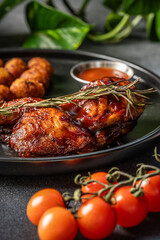 Grilled barbecue chicken with rosemary and sauce