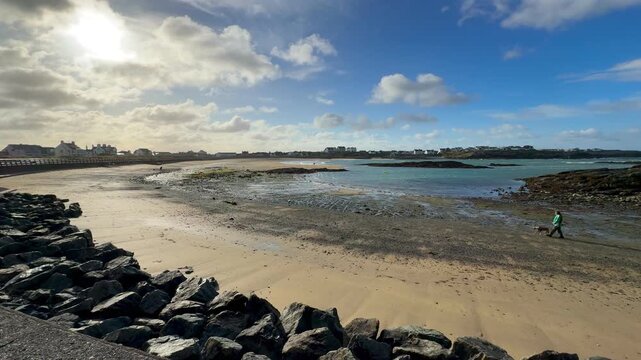 Eary morning walk on the beach at Trearddur Bay on the Isle of Anglesey - Wales
