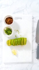 Sliced limes and spices on a cutting board