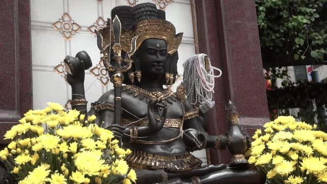 Trimurati statue, Hindu god statue in temple.	