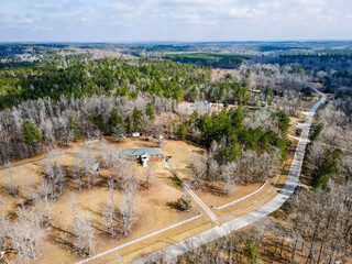 Aerial landscape rural neighborhood winter after Hurricane Helene in Appling Augusta Georgia