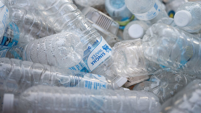 Bangkok, Thailand - 5 September  2025: Many drinking water bottles are junked in recycle type trash bin. Waste seperation for material recycling. 