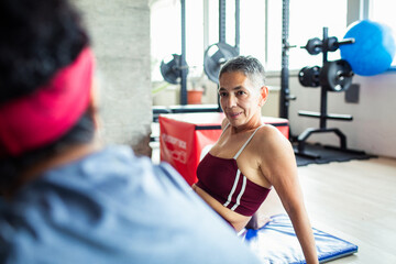 Woman Exercising in Gym