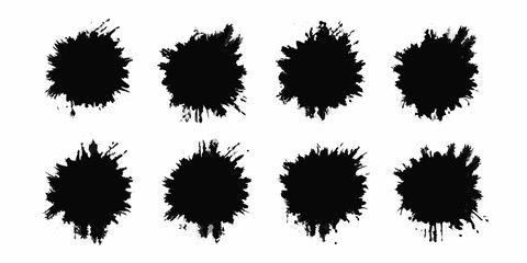 Collection of eight black ink splatters and splashes on a white background