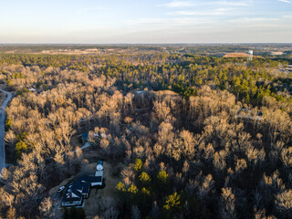 Aerial landscape rural neighborhood winter after Hurricane Helene in Appling Augusta Georgia