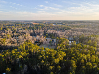 Aerial landscape rural neighborhood winter after Hurricane Helene in Appling Augusta Georgia