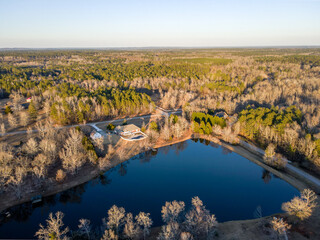 Aerial landscape rural neighborhood winter after Hurricane Helene in Appling Augusta Georgia