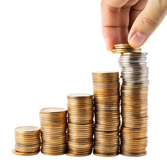 Hand stacking coins on a growing pile of money, isolated on transparent background
