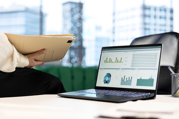 Financial Analyst Evaluating Reports and Data for Business Growth