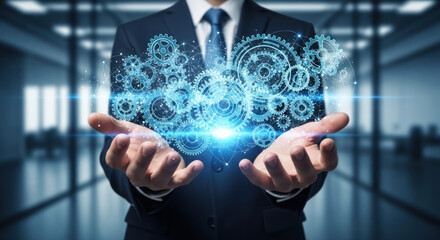 A businessman in a suit holds glowing, interconnected gears and cogs in his open hands, symbolizing innovation and technological advancement.