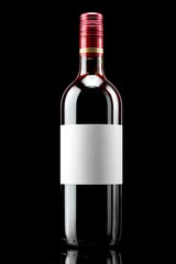 A dark red wine bottle with a blank white label and a red cap sits against a stark black backdrop, offering a polished and elegant aesthetic