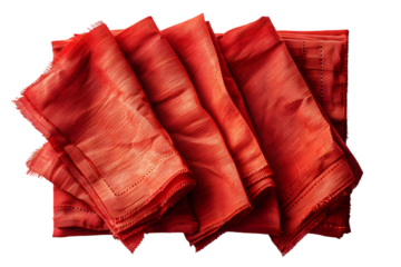 Red linen napkins with folded stack.