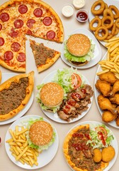 view table scene with assorted takeout and delivery foods including pizza, pide, hamburgers, doner, fried chicken, and tasty sides.