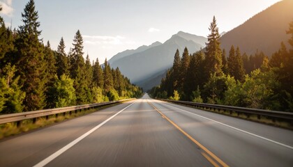 Fototapeta premium Point-of-view driving a car on a highway through a forest with mountains in the distance