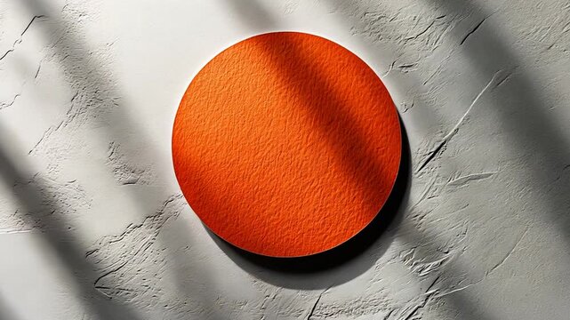 An orange circle coaster mockup on a textured white wall with overlay shadows.