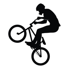 Fototapeta premium Bmx rider silhouette performing a wheelie skill on a bicycle silhouette