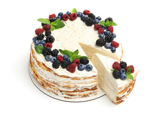 Tasty crepe cake with berries and mint isolated on white