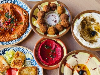Mezze Platter with dips like hummus,  baba ganoush, falafel balls, Muhmmara and labneh 