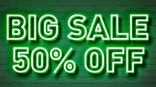 Dynamic neon sign glows 'BIG SALE 50% OFF' on brick wall, capturing attention.
