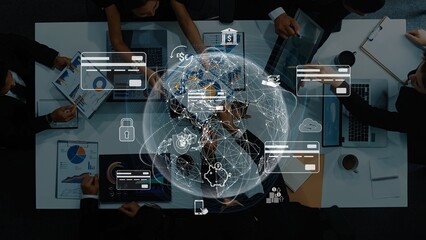 A group of professionals collaborates in a business meeting, analyzing financial data and strategies, with a digital world map overlay showcasing connectivity and innovation. Raster