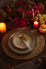 Autumn Table Setting with Pumpkins, Candles and Leaf Decor