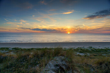 Fototapeta premium Amazing summer sunset view over the North Sea near Petten, Netherlands