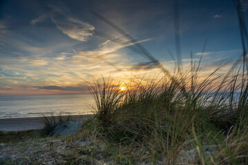 Fototapeta premium Amazing summer sunset view over the North Sea near Petten, Netherlands