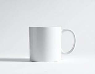 Simple white mug on a clean white background, perfect for custom designs and branding.