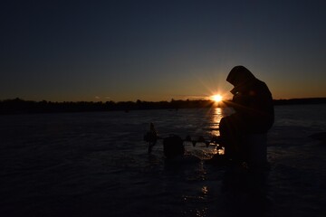 Ice fishing on Wolf Lake 