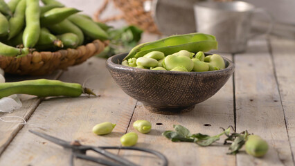 Fresh and raw green broad beans
