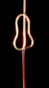 Funky Neon Orange Straw With Flowing Beverage