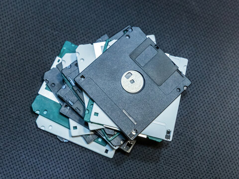 many floppy disks for storing information. symbol of storing and saving information on a computer