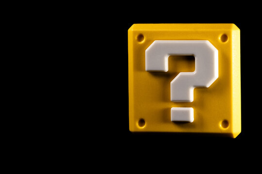 Super Mario yellow question block on the black background at right side of the screen
