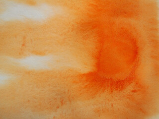 Handcrafted warm abstract background. Bright orange pigments spread naturally across the paper, creating a vibrant freeform pattern. Perfect for modern backgrounds or illustration projects.
