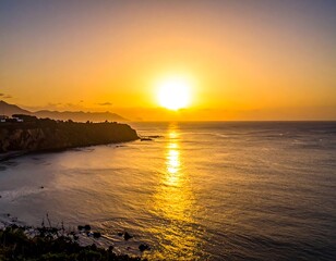 Golden sunrise over a tranquil coastline