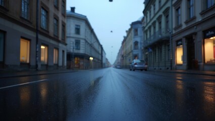 Naklejka premium Quiet rainy street scene urban city photography evening low angle stillness in motion