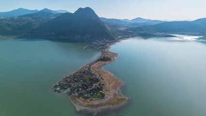 A magnificent island city in the middle of a lake. This is a stunning aerial video of the lake and...