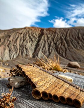 Colorful mountain landscape with a panpipe