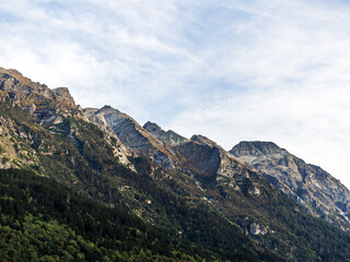 Majestic Mountain Range Under a Cloudy Sky