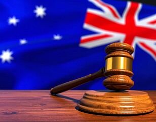 Judge Gavel on Desk with Australian Flag Background.jpg