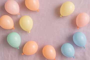 colorful party balloons background. Party balloons in pastel colors background with space for text.