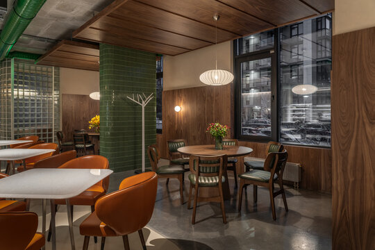 Illuminated modern restaurant with colorful interior elements