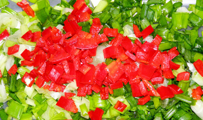 Freshly chopped red bell peppers and green onions