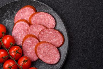 Sliced salami sausage, smoked dry meat as food background. Sliced salami